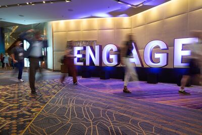man standing beside stage
