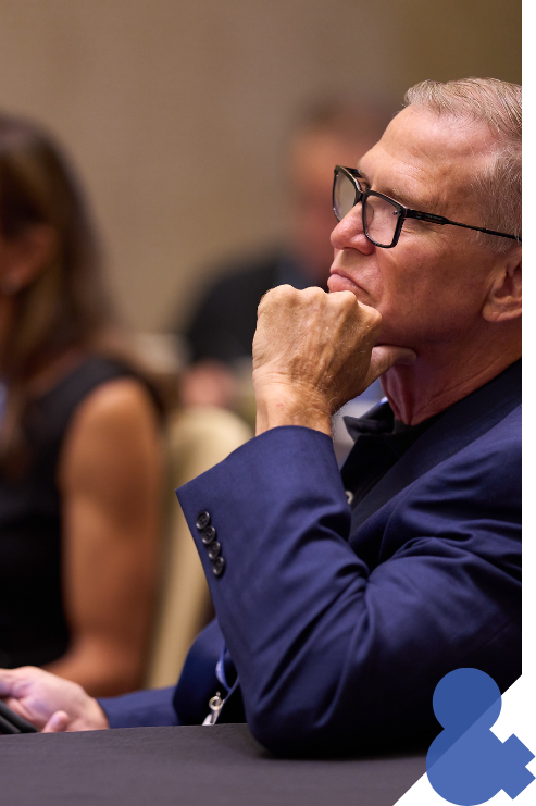 A man listening to a presentation