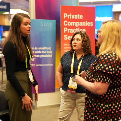 three people conversing